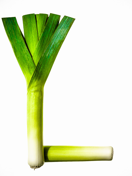 Photo of Leeks, laid out in the shape of the letter "L"