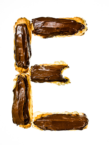 Photo of Eclairs laid out in the shape of the letter "E"