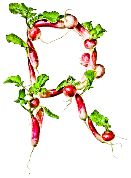 Photo of Radishes, laid out in the shape of the letter "R"