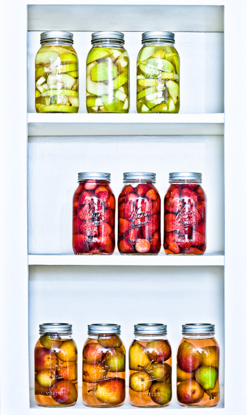 Images of preserves on a shelf. © 2014 Dana Hursey Photography