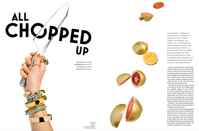 Photo of hand with knife chopping though golden colored fruit