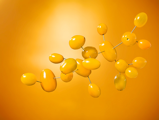 Photography of Yellow Cherry Tomatoes in the shape of a molecular structure